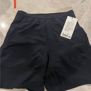 Men’s Black Lululemon shorts (medium) tags still on 7” inseam; never worn.